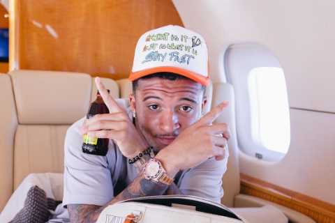 Inside Man Utd star Jadon Sancho’s private holiday jet including luxury diamond watches and Louis Vuitton bags