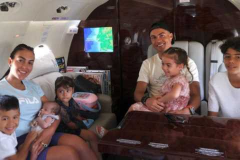 Georgina Rodriguez proudly cradles baby Bella Esmerelda as Cristiano Ronaldo and family jet off on holiday for break
