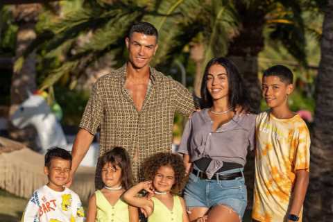 Man Utd star Cristiano Ronaldo and Georgina pose with kids and family friends in cute Majorca holiday pictures