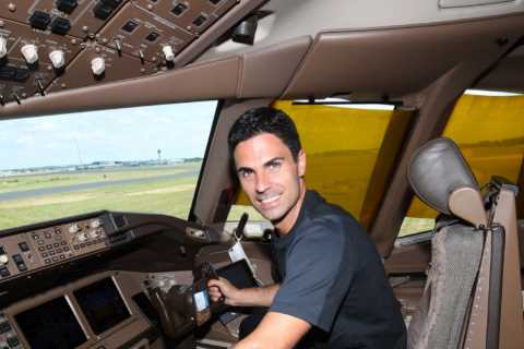 Mikel Arteta sits in cockpit of Arsenal’s private jet before stars are swarmed by fans as they arrive in US for tour