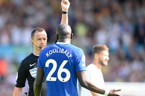 How many games do players miss for red card in Premier League and Champions League?