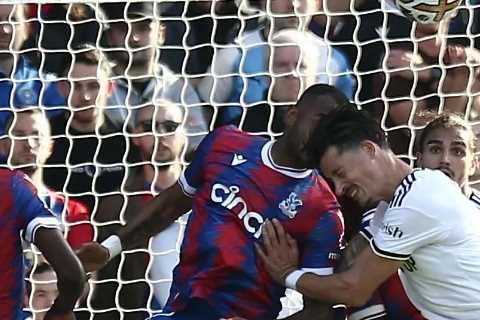 Crystal Palace ace Jordan Ayew plays on with five stitches and bloodied headband after sickening clash with Robin Koch