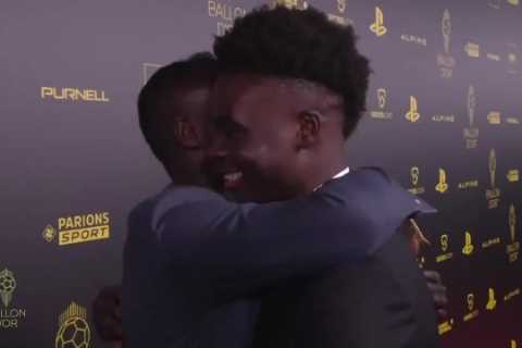 Watch Sadio Mane whisper message to Arsenal star Bukayo Saka at Ballon d’Or ceremony amid Liverpool transfer links