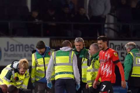 Luton star Sonny Bradley involved in sickening collision and given oxygen before being stretchered off against Reading