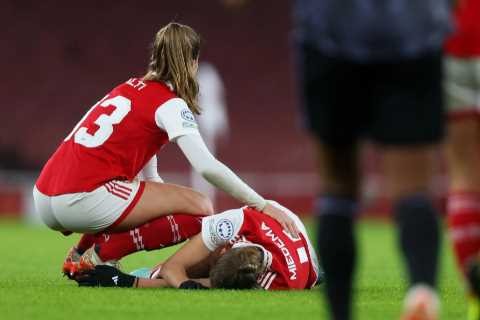 Arsenal Women star Vivianne Miedema stretchered off in tears after suffering worrying knee injury against Lyon