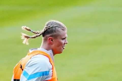 ‘Viking mode activated’ – Erling Haaland shows off new pigtails hairstyle as Man City prepare for Premier League return