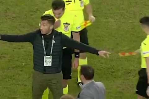Watch astonishing moment ex-Liverpool star Nuri Sahin rushes to protect referee from his OWN Antalyaspor players