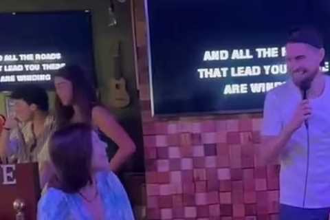 Watch Arsenal star Jorginho belt out Oasis track as he does karaoke with stunning Wag Catherine Harding on Italy holiday