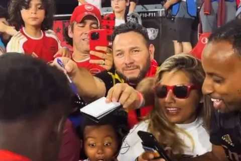 Heartwarming moment young Arsenal fan is left in shock after Bukayo Saka gives him his boots
