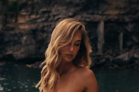 Ex-Premier League Wag and ‘world’s most beautiful woman’ leaves fans convinced she’s not real with stunning bikini snaps