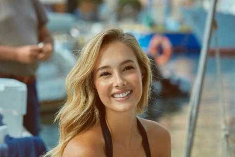 Former Premier League Wag and ‘world’s most beautiful woman’ thrills fans in low-cut swimsuit