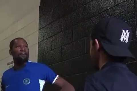 Watch Ben Chilwell hand 6ft 10in NBA star Kevin Durant a tiny Chelsea shirt as fans joke ‘he gave him a crop top’
