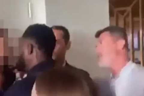 Shocking moment Roy Keane & Micah Richards get in ‘heated argument with fan’ during Arsenal’s 3-1 win over Man Utd