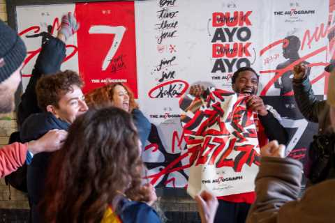 Arsenal Fans Search for Limited Edition Bukayo Saka Posters in North London