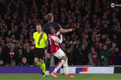 Arsenal Fans Outraged as Harry Kane Avoids Red Card After Elbowing Gabriel in Throat During Bayern Munich Clash